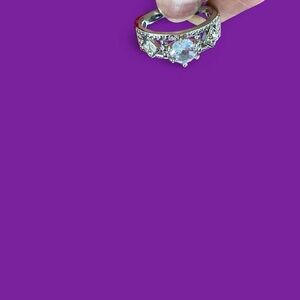 Silver tone rhinestone ring with details